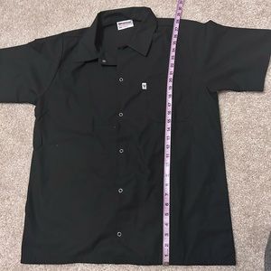 Man’s medium short sleeve shirt.